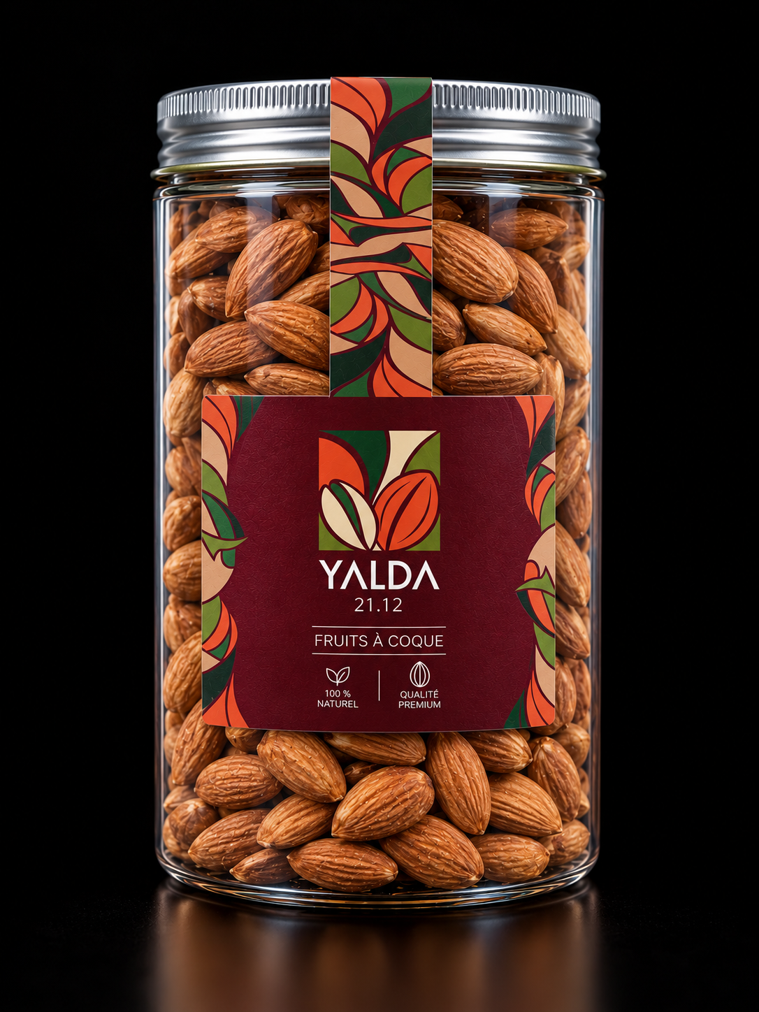 Bocal YALDA rempli d'amandes, avec étiquette végétale rouge et verte