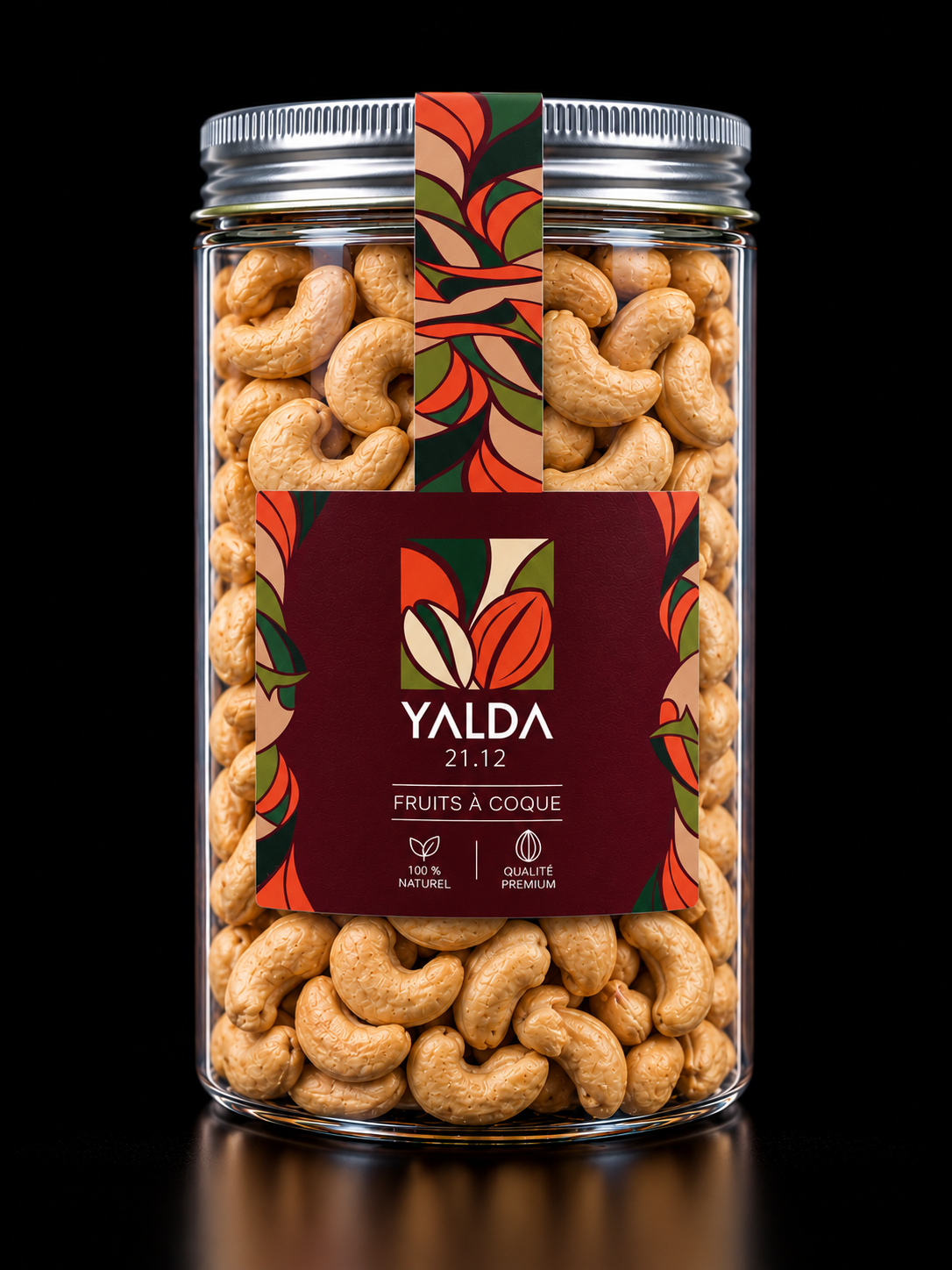 Bocal YALDA rempli de noix de cajou, avec étiquette végétale rouge et verte