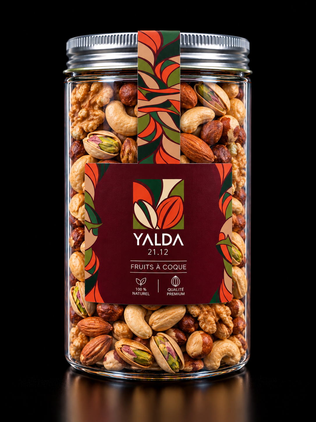 Bocal YALDA contenant un mélange de fruits à coque, avec étiquette végétale rouge et verte