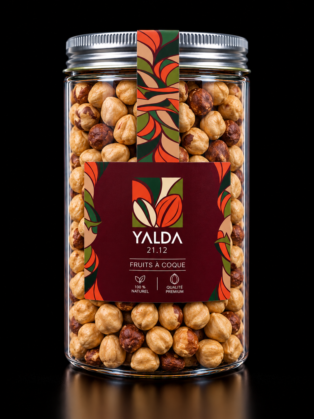 Bocal YALDA rempli de noisettes, avec étiquette végétale rouge et verte