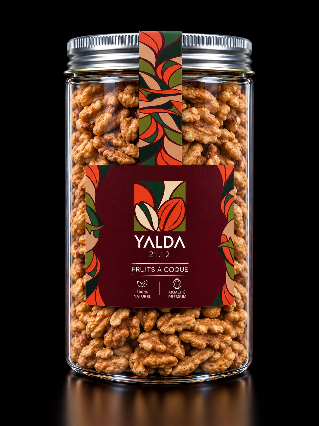 Bocal YALDA rempli de noix, avec étiquette végétale rouge et verte